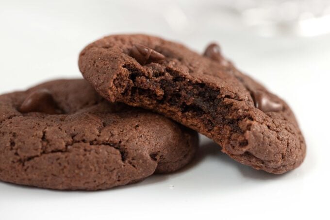 Chocolate cake mix cookies with bite showing soft and fudgy texture