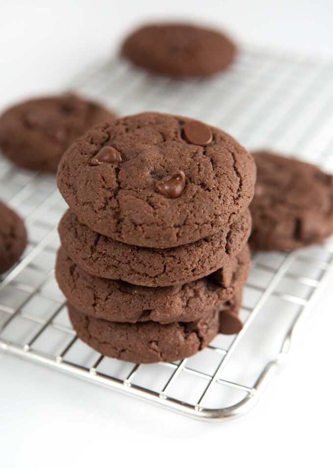 Stack of chocolate cake mix cookies on cooling rack