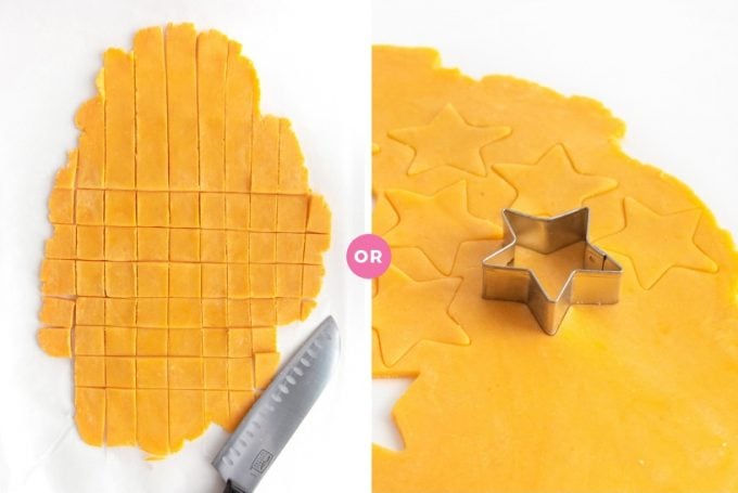 Cutting homemade cheese cracker dough with knife and star cookie cutter
