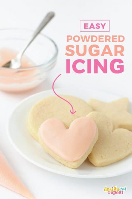 plate of heart sugar cookies with powdered sugar icing for cookies