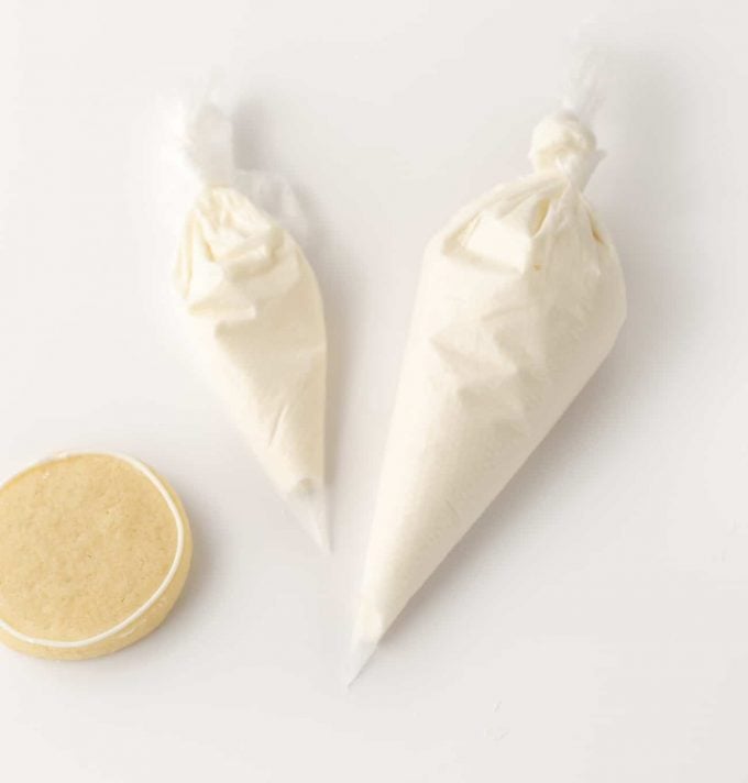 Piping bags with white Royal Icing for Sugar Cookies