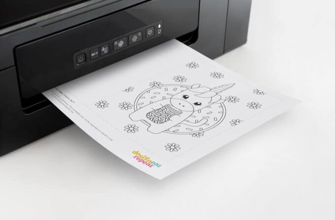 Printer with unicorn birthday card coming out